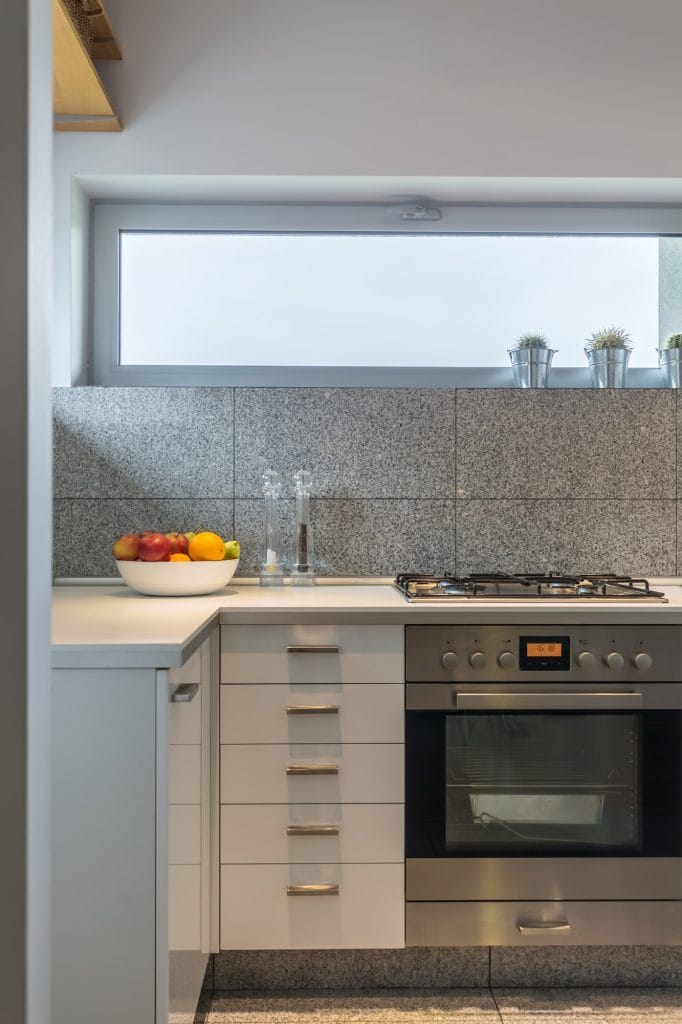 Granite tiles interior in simple kitchen